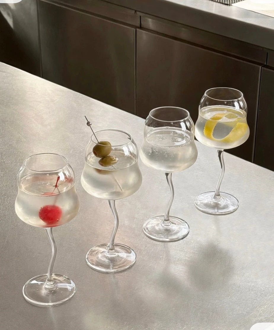 Wavy wine glasses styled for cocktail hour